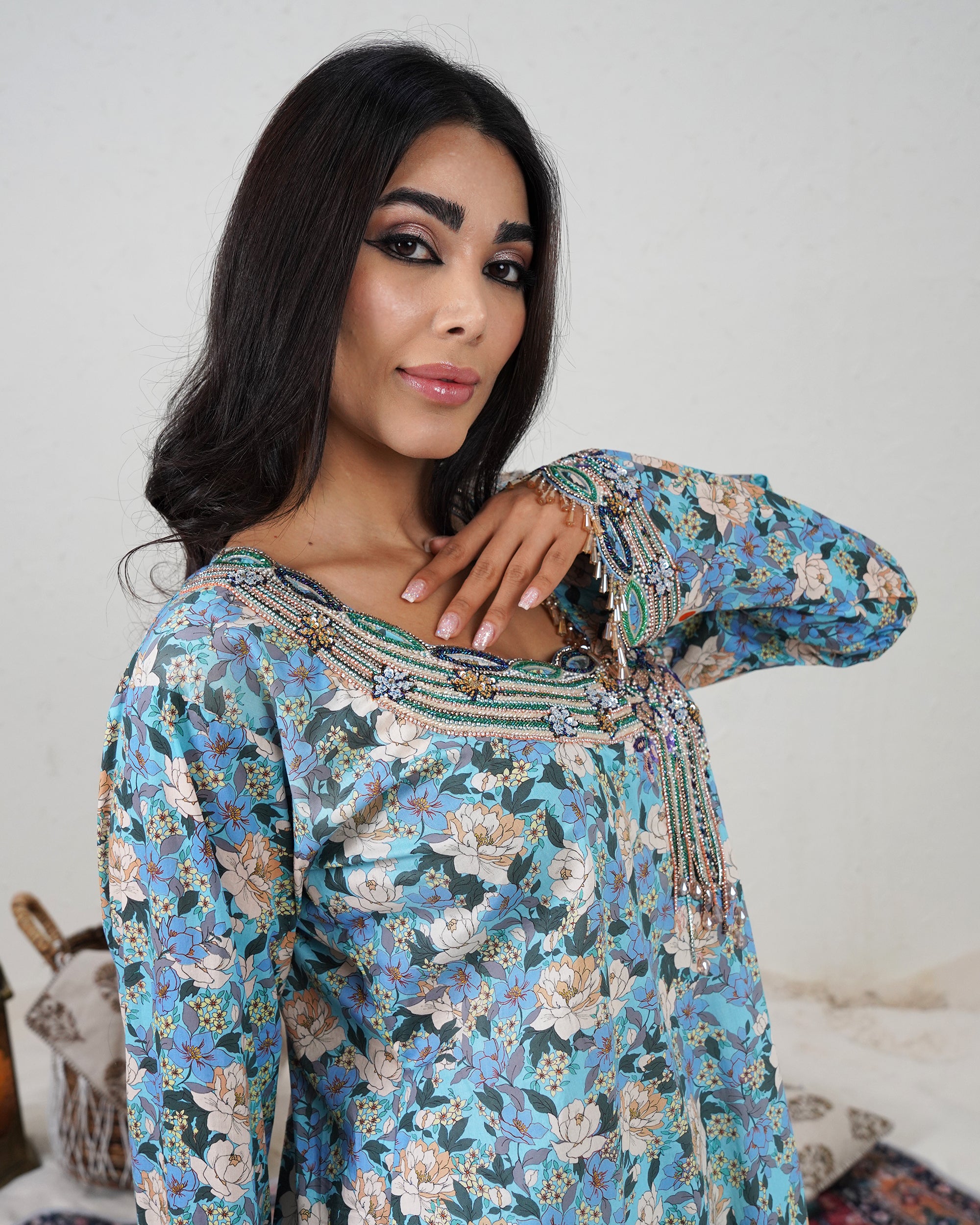 Eyelet chains with bunch of flower with tassels